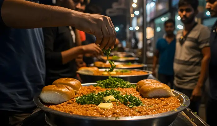 Indian street food pav bhaji being served hot with butter and pav buns